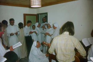 Father Florian surrounded by brothers and sisters of his order
